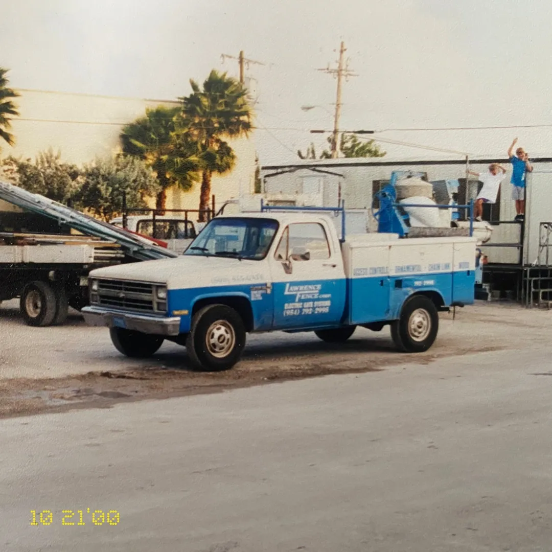 Vintage 10/21/00 photo of the original Lawrence Fence Corp blue & white truck