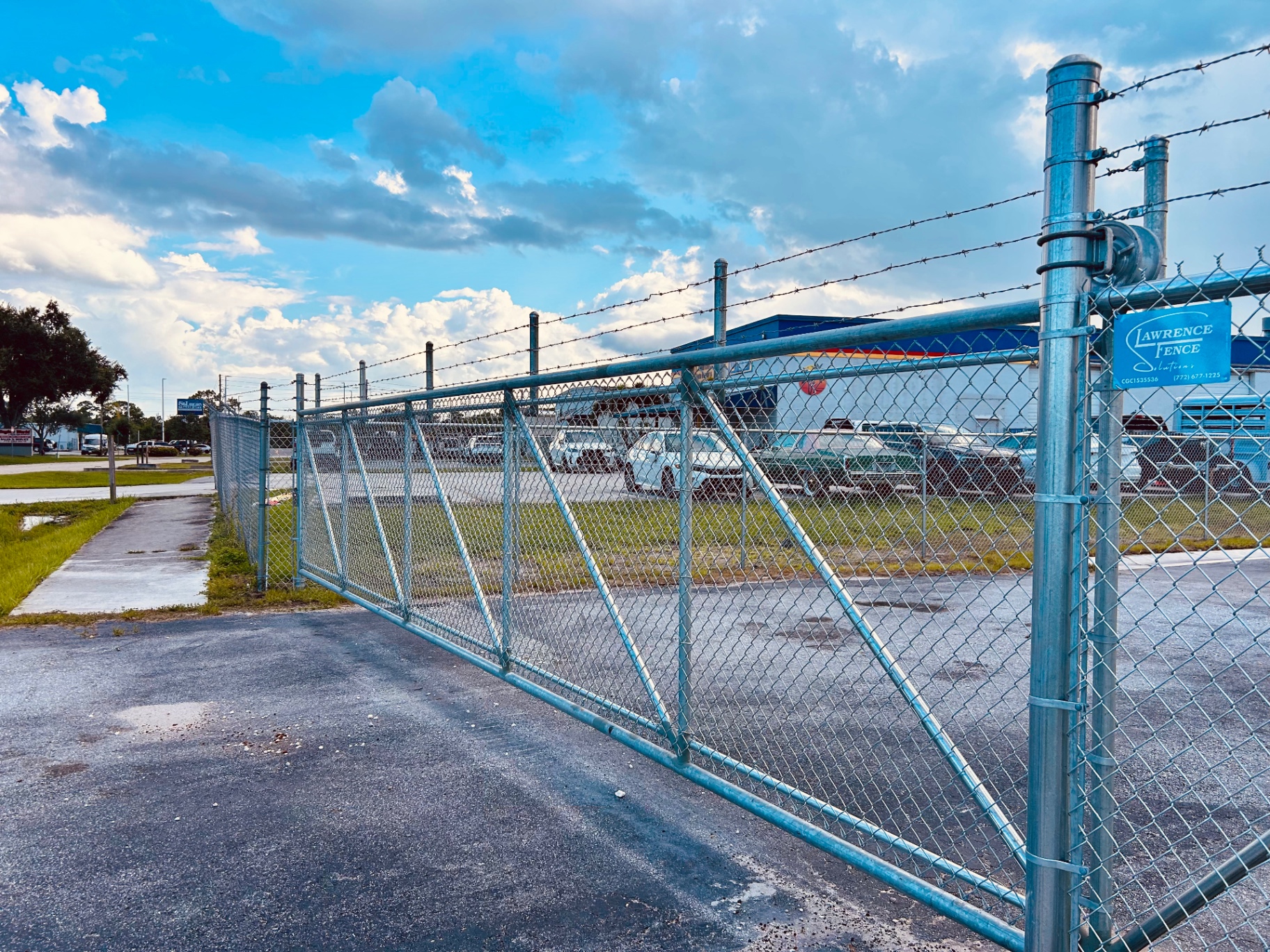 Commercial chain-link double swing gate at Lawrence Fence yard
